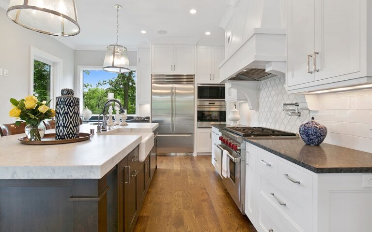 Durable and stylish quartz countertops in a modern rental property kitchen.