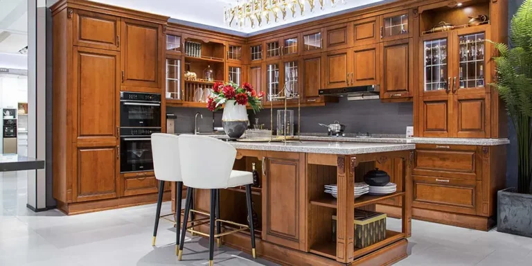 Custom wooden kitchen cabinets in a luxurious Frisco, Texas home with modern design.