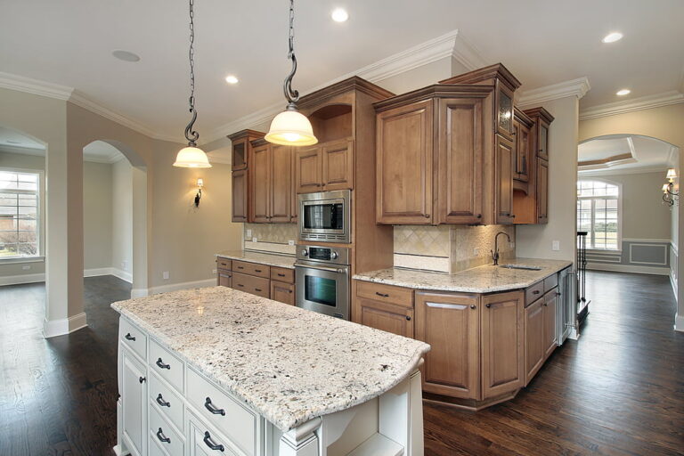 Modern Frisco kitchen featuring wooden cabinets with quartz countertops