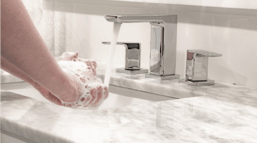 Modern dual-handle bathroom tap in a luxury Frisco home