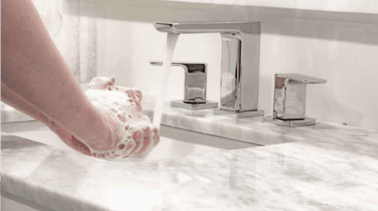Modern dual-handle bathroom tap in a luxury Frisco home